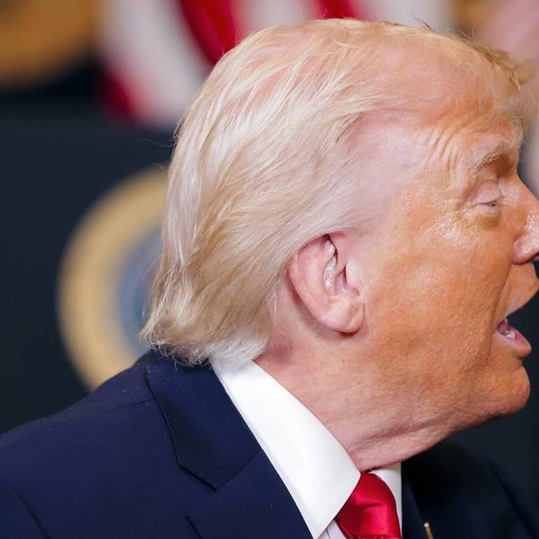 Profile view of Trump's face showing orange skin blending to white and pink