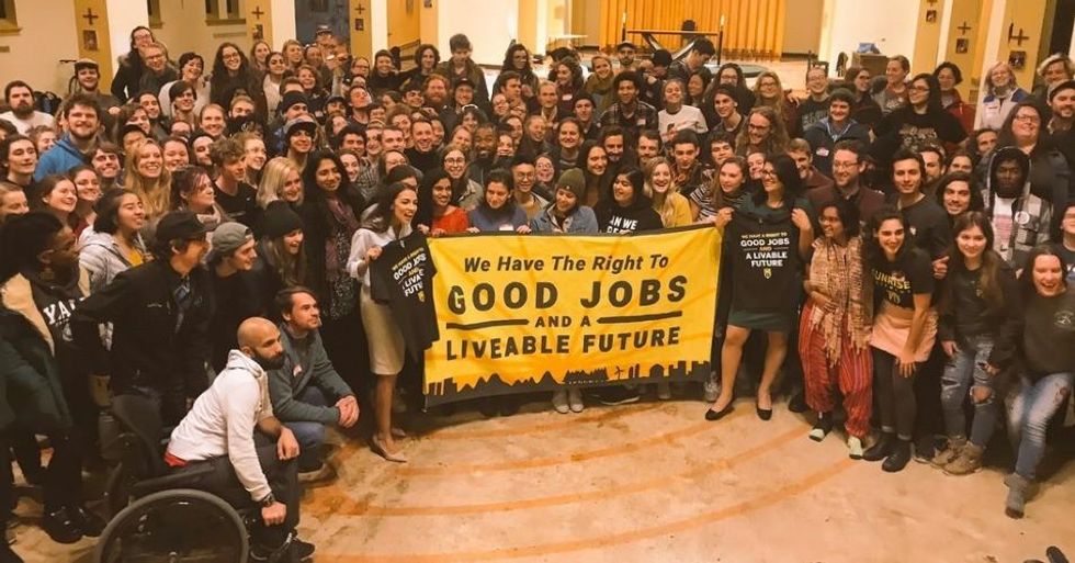 Progressive congresswomen-elect Alexandria Ocasio-Cortez (D-N.Y.) and Rashida Tlaib (D-Mich.) joined protesters this week in demanding that the Democratic Party take bold action to help curb the climate crisis. (Photo: Sunrise Movement)