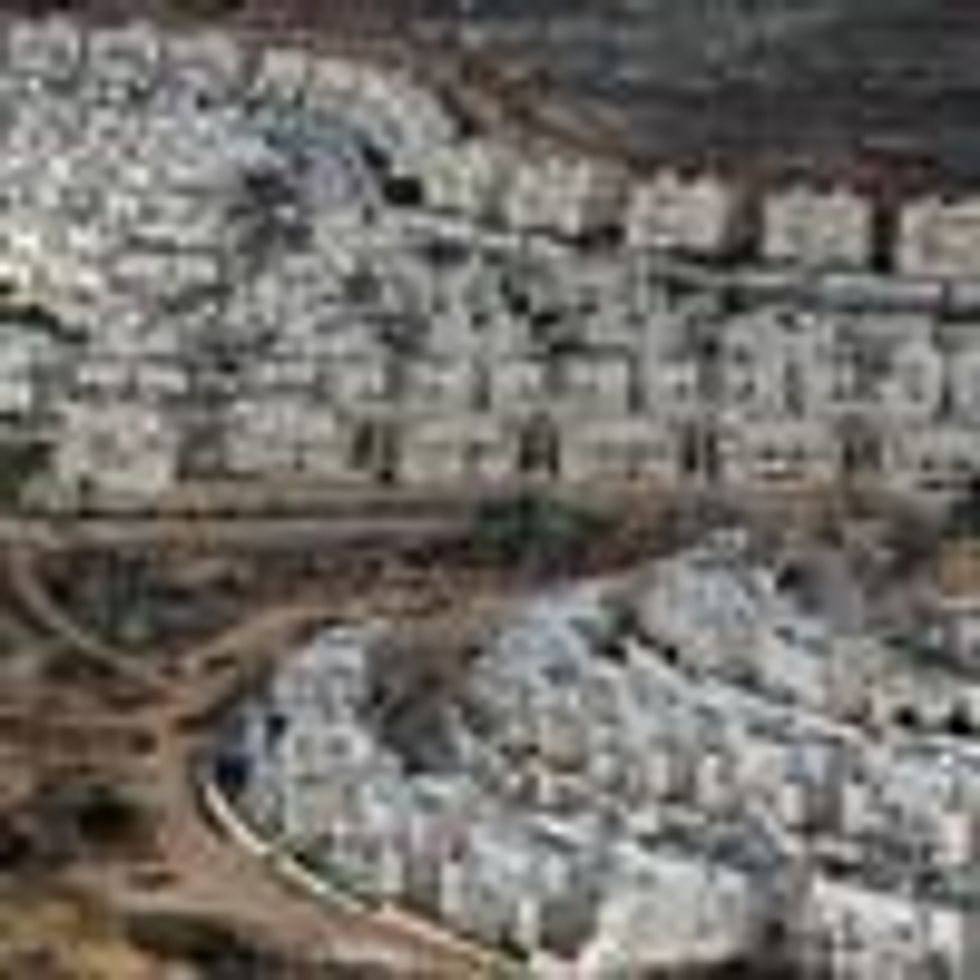 Prominent international critics have called Israel's Jews-only settlements, as well as segregated roads and other infrastructure, a form of apartheid. (Photo: The West Bank settlement of Givat Zeev is pictured in late December, 2016)