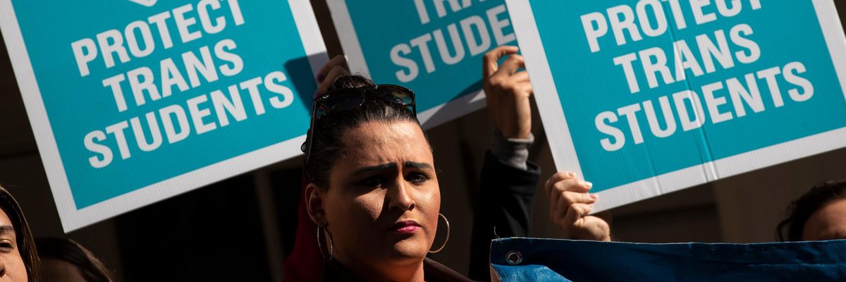 "Protect Trans Students" signs at protest