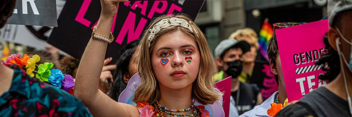"Protect trans youth" sign
