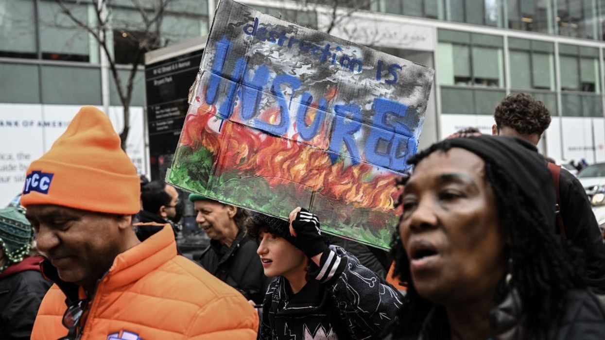 Protest against insurance companies causing environmental pollution in New York