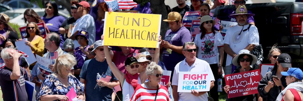 Protest against Trump budget bill.