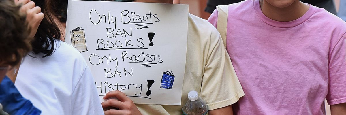 protest sign against book bans