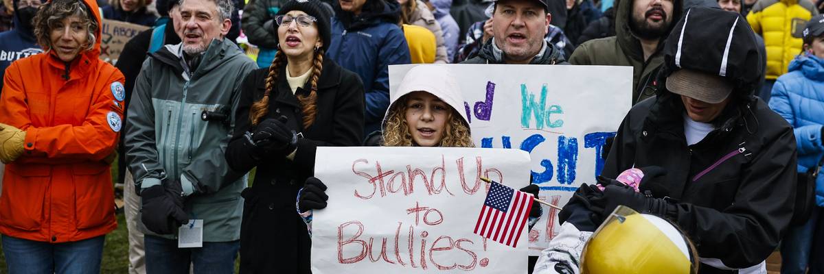 Protest urging Harvard to stand up to Trump.