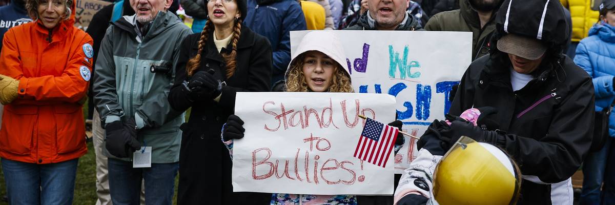 Protest urging Harvard to stand up to Trump.