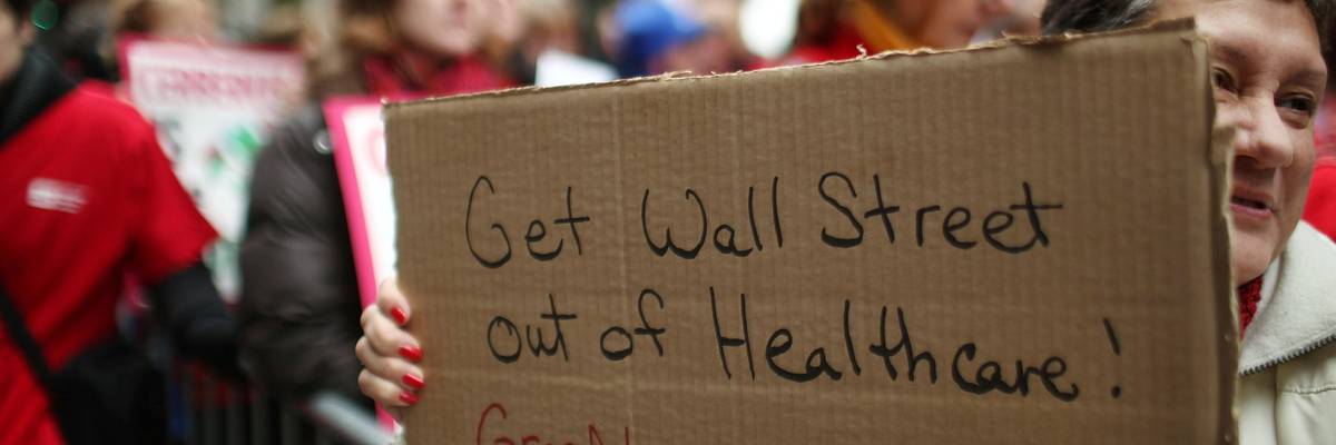 Protester holds placard