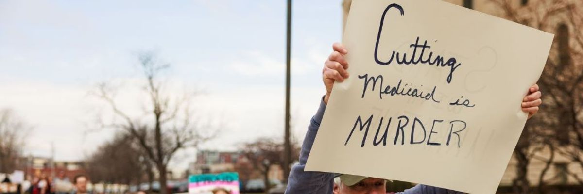 Protester opposes Medicaid cuts
