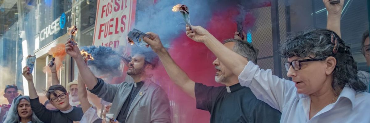 Protesters burning money.