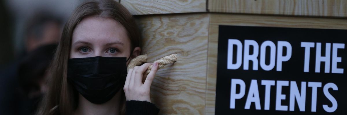 Protesters carry mock coffins in London