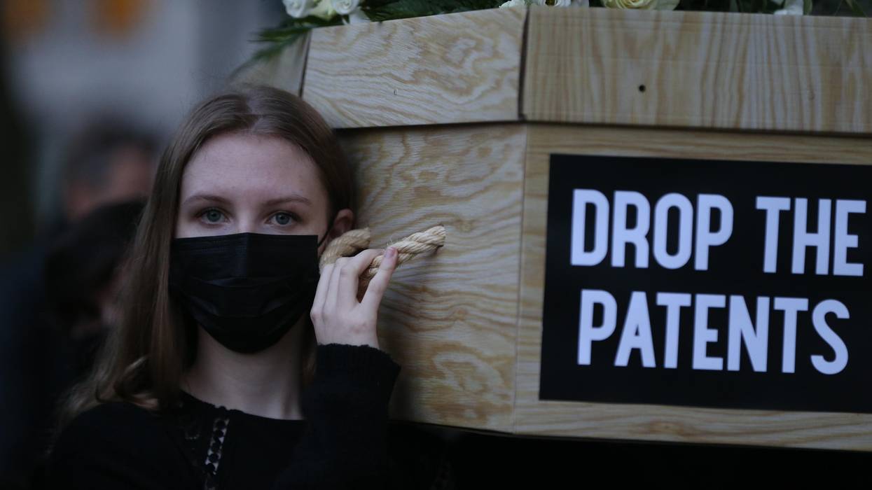 Protesters carry mock coffins in London