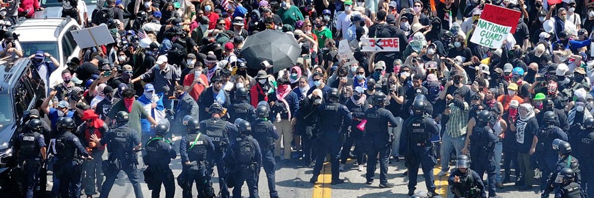 Protesters clash with police in Los Angeles as Trump administration continues immigration raids