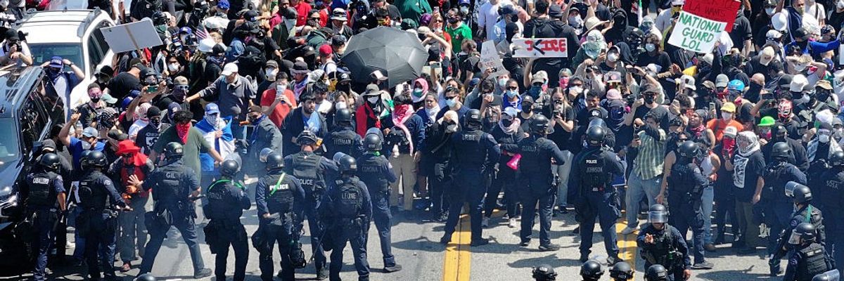 Protesters clash with police in Los Angeles as Trump administration continues immigration raids