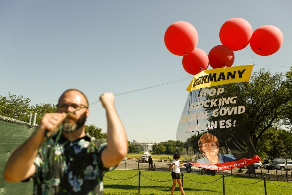 Protesters demand Merkel support vaccine patent waiver