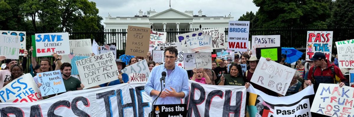 Protesters demand US President Joe Biden "Pass the Torch"
