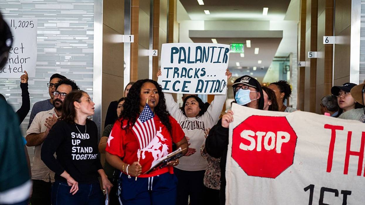 Protesters demonstrate against Palantir contracts with ICE