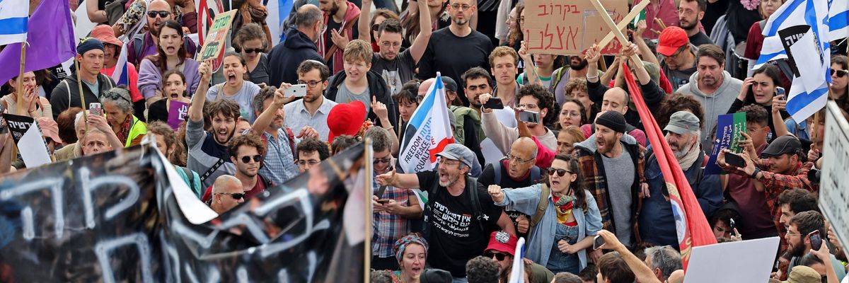 Protesters demonstrate outside Israel's parliament
