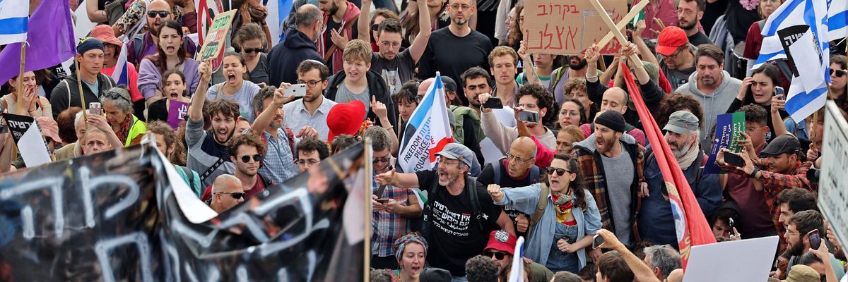Protesters demonstrate outside Israel's parliament