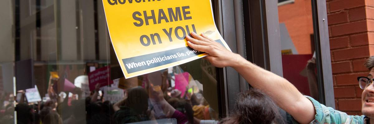 Protesters demonstrate outside of the offices of Missouri's Republican governor.