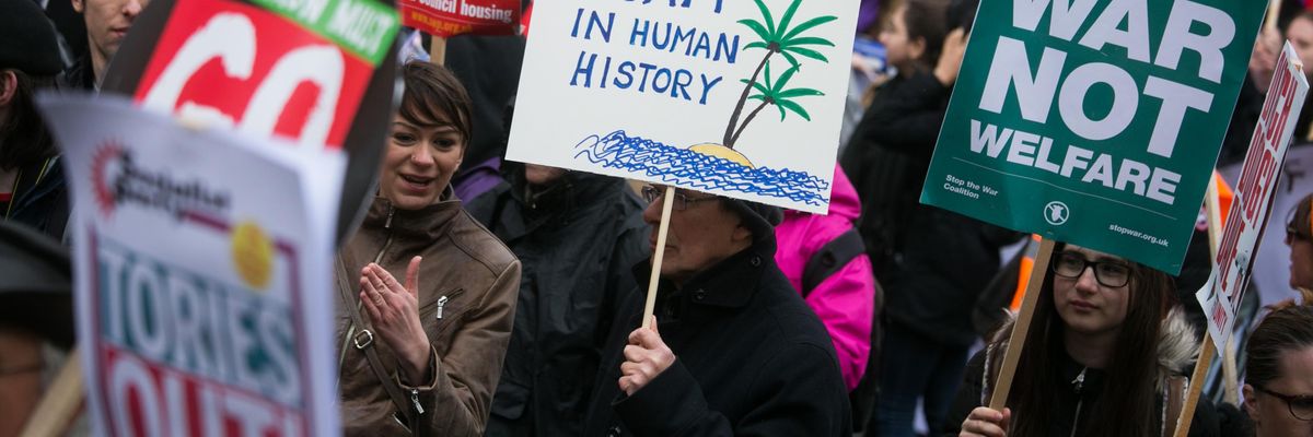 Protesters denounce offshore tax evasion.