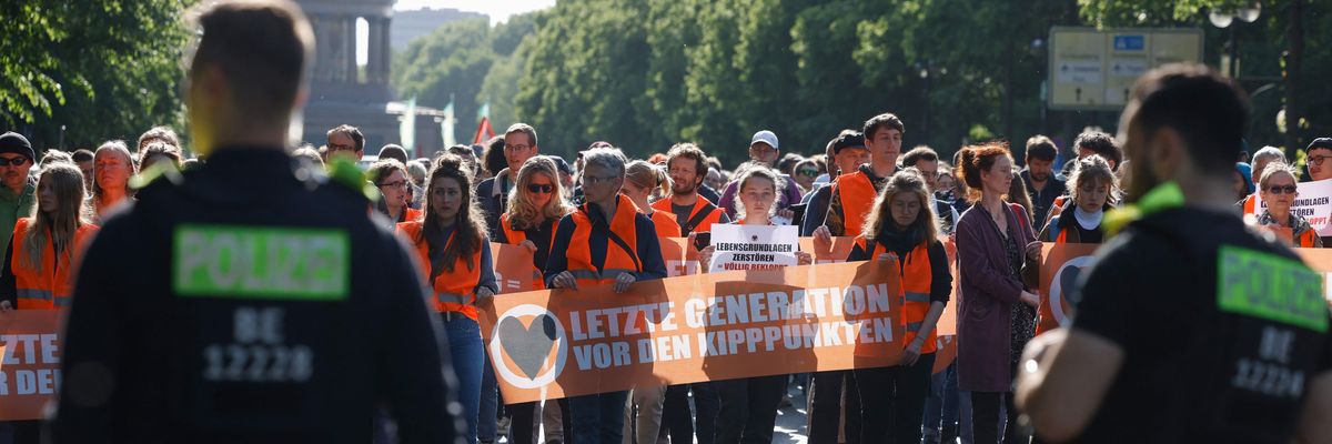 Protesters face off with police.