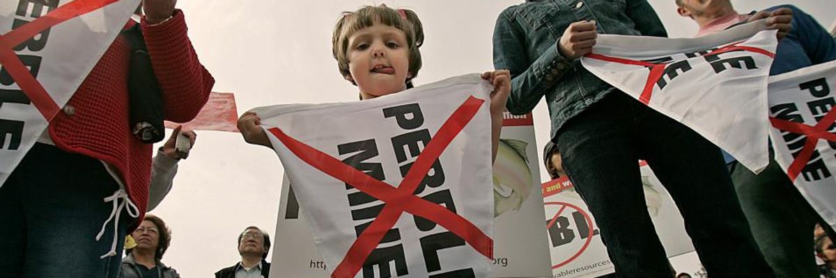 Protesters gather in Dillingham, Alaska for a rally against the Pebble Mine.