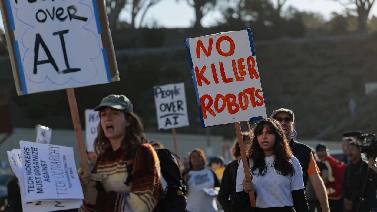Protesters gather outside an OpenAI developers conference