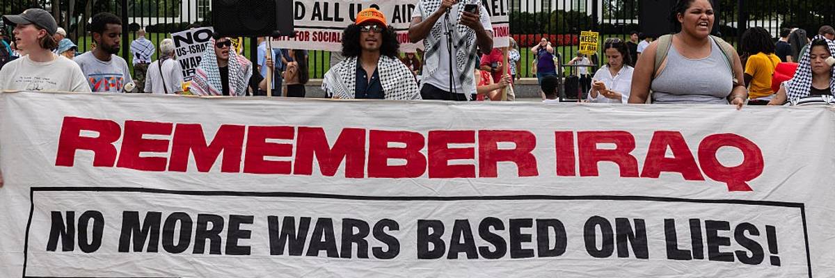 Protesters gather outside the White House to condemn US...