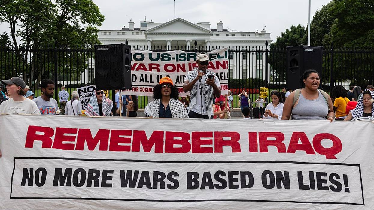Protesters gather outside the White House to condemn US...