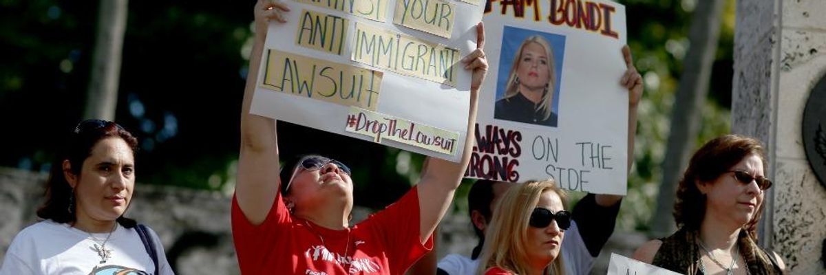 Federal Judge in Texas Places Injunction on Obama Immigration Plan