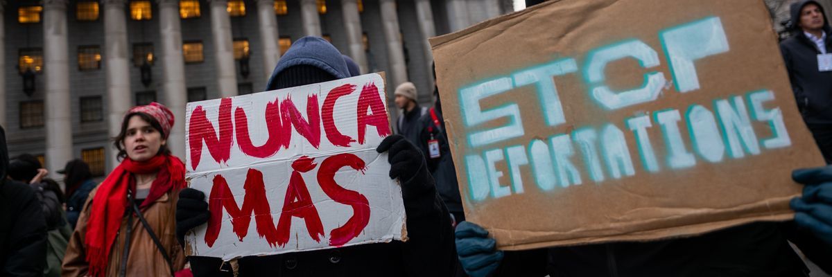 Protesters hold a rally and march against the immigration policies of the Trump administration