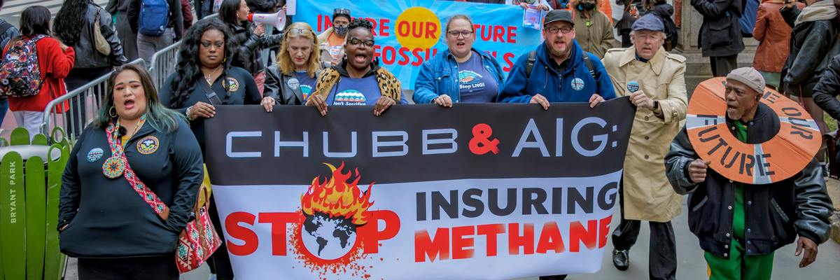 Protesters march against insurance companies Chubb and AIG for insuring the Rio Grande LNG project