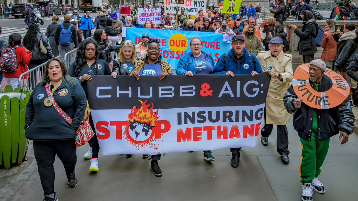 Protesters march against insurance companies Chubb and AIG for insuring the Rio Grande LNG project
