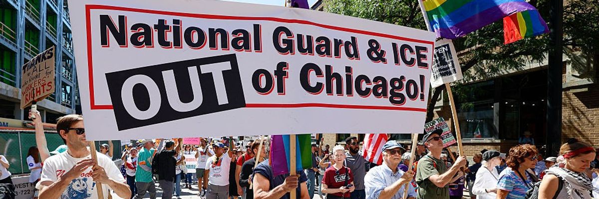 Protesters march during a "Workers Over Billionaires" rally in Chicago