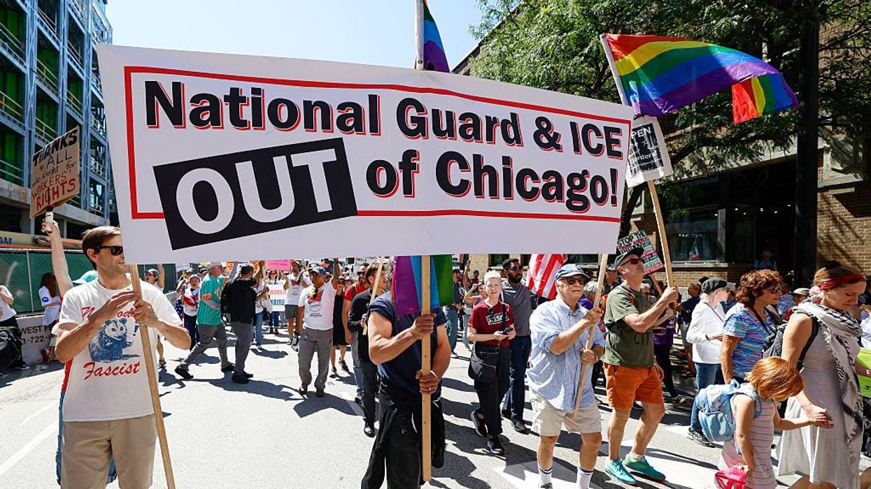 Protesters march during a "Workers Over Billionaires" rally in Chicago