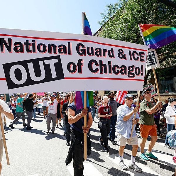 Protesters march during a "Workers Over Billionaires" rally in Chicago