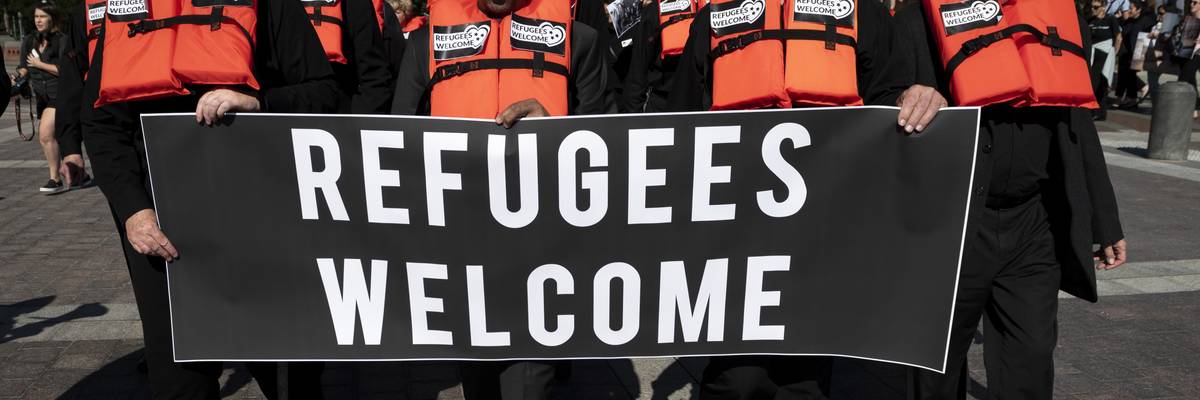 Protesters march for refugee rights in the U.S.