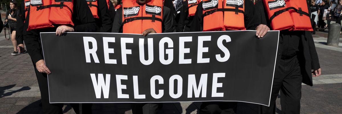 Protesters march for refugee rights in the U.S.