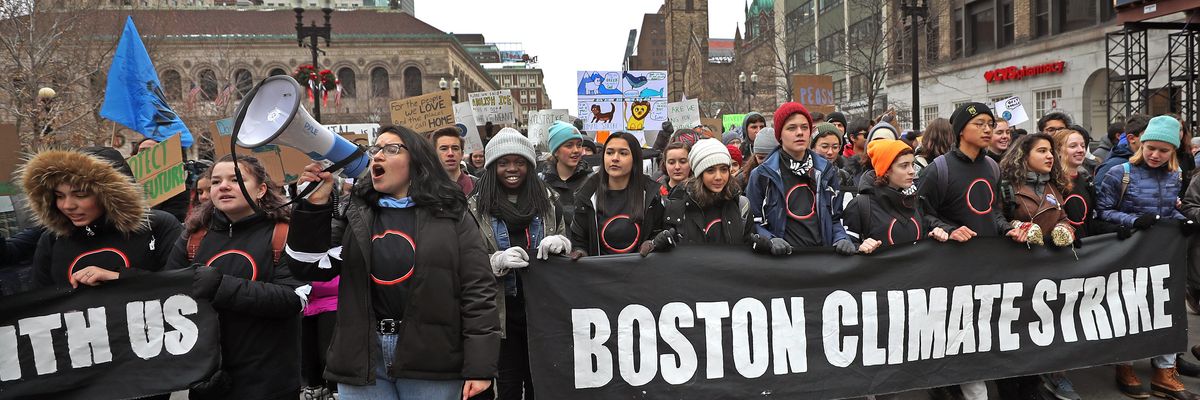 Protesters march from Copley Plaza to the Massachusetts State House in Boston to call for climate action on December 6, 2019.