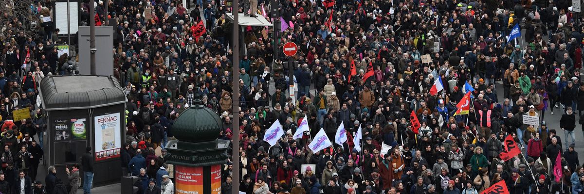 ​Protesters march in Paris on January 31, 2023.