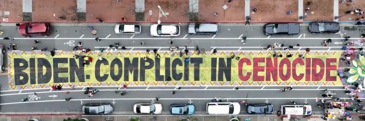 Protesters painted the message, "Biden complicit in genocide" 