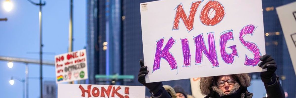 Protesters participate in a "'No Kings on Presidents Day" action