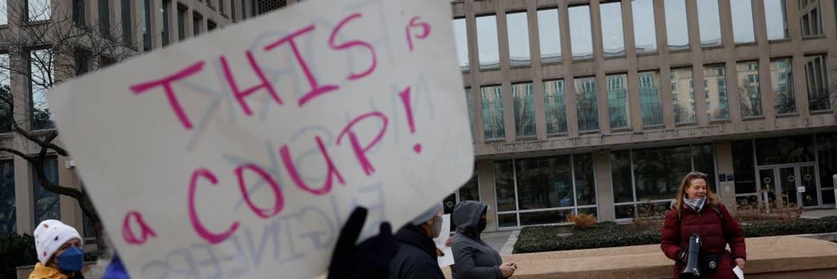 Protesters rally against Elon Musk outside OPM headquarters