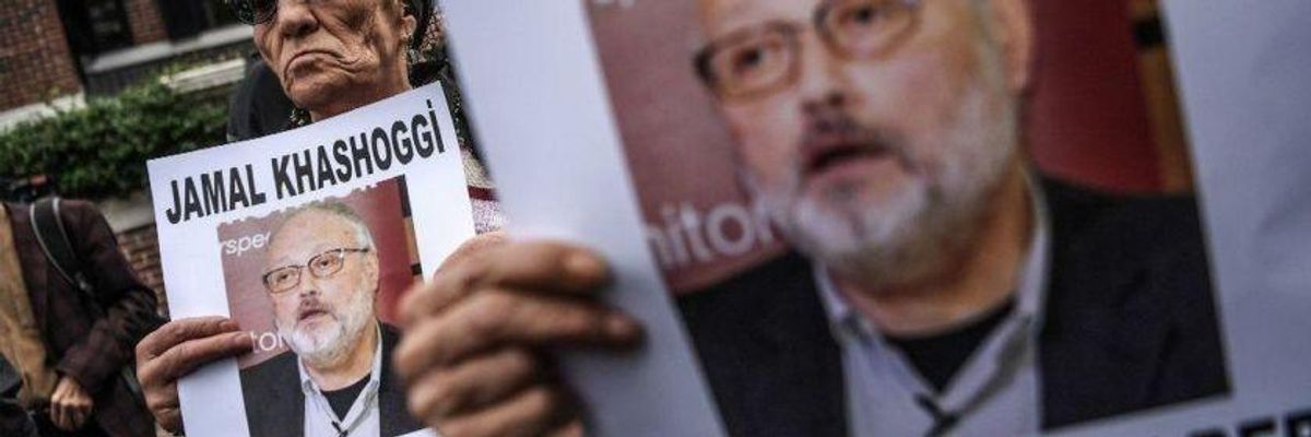 Protesters rally outside the Saudi Arabia Consulate