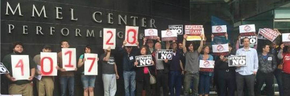 'Just Say No to Mega-Mergers!' 400,000 Signatures Delivered as Comcast Shareholders Meet