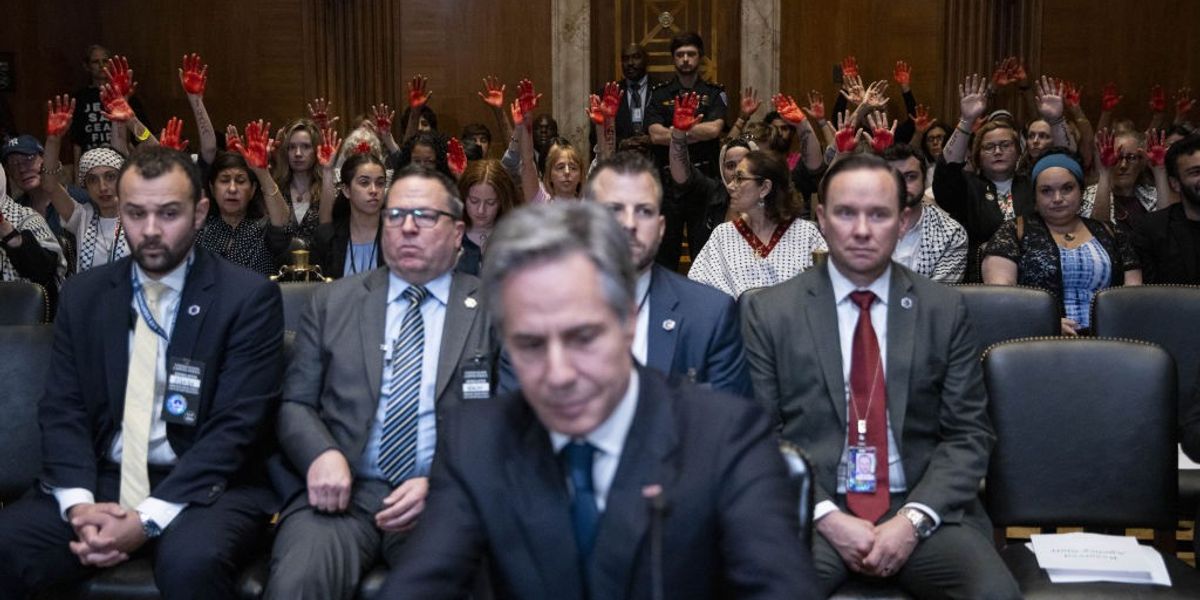 Protesters target 'war criminal' Antony Blinken