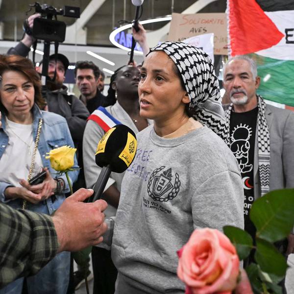 Protesters welcome returned Global Sumud Flotilla activists at Paris airport