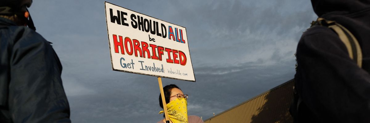 Protestors demonstrate near a US Immigration and Customs Enforcement detention facility in Broadview,