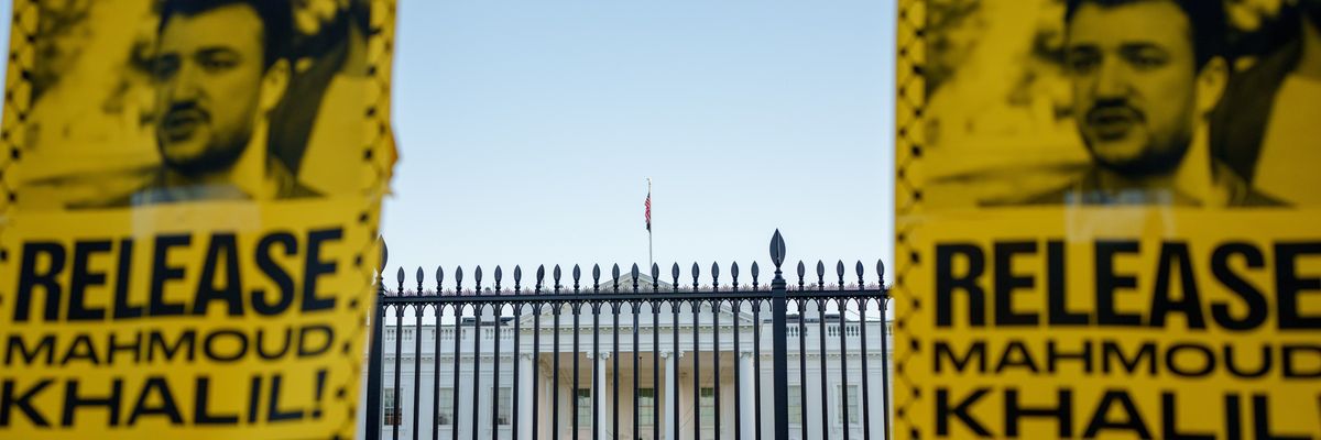 Protestors hold signs calling for the release of former Columbia University student Mahmoud Khalil