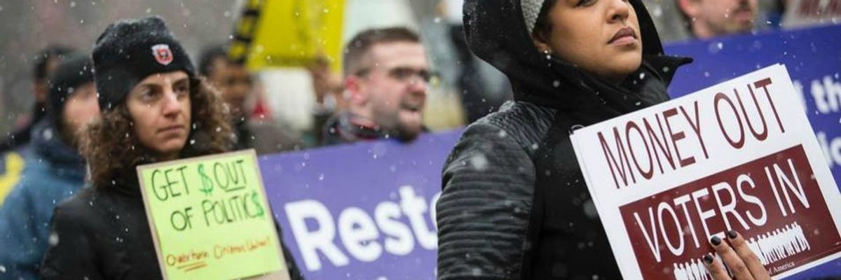 Protestors rally against the Supreme Court's Citizens United decision.